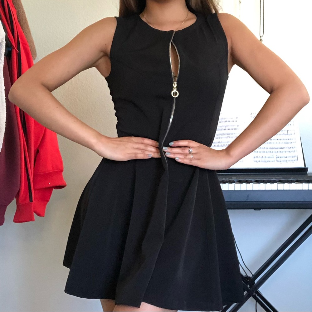 A black elegant flowy business dress